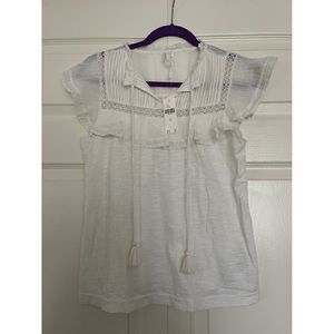 Anthropologie Flutter Sleeve Top with Lace and Tassel Detail